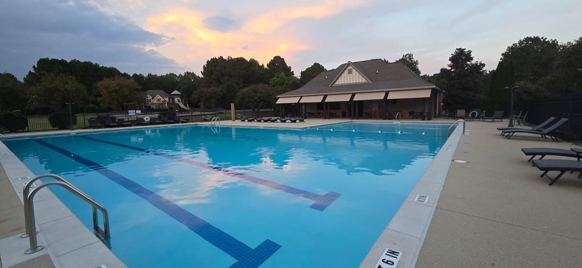 HOA community pool at sunset — Blue Master Pools
