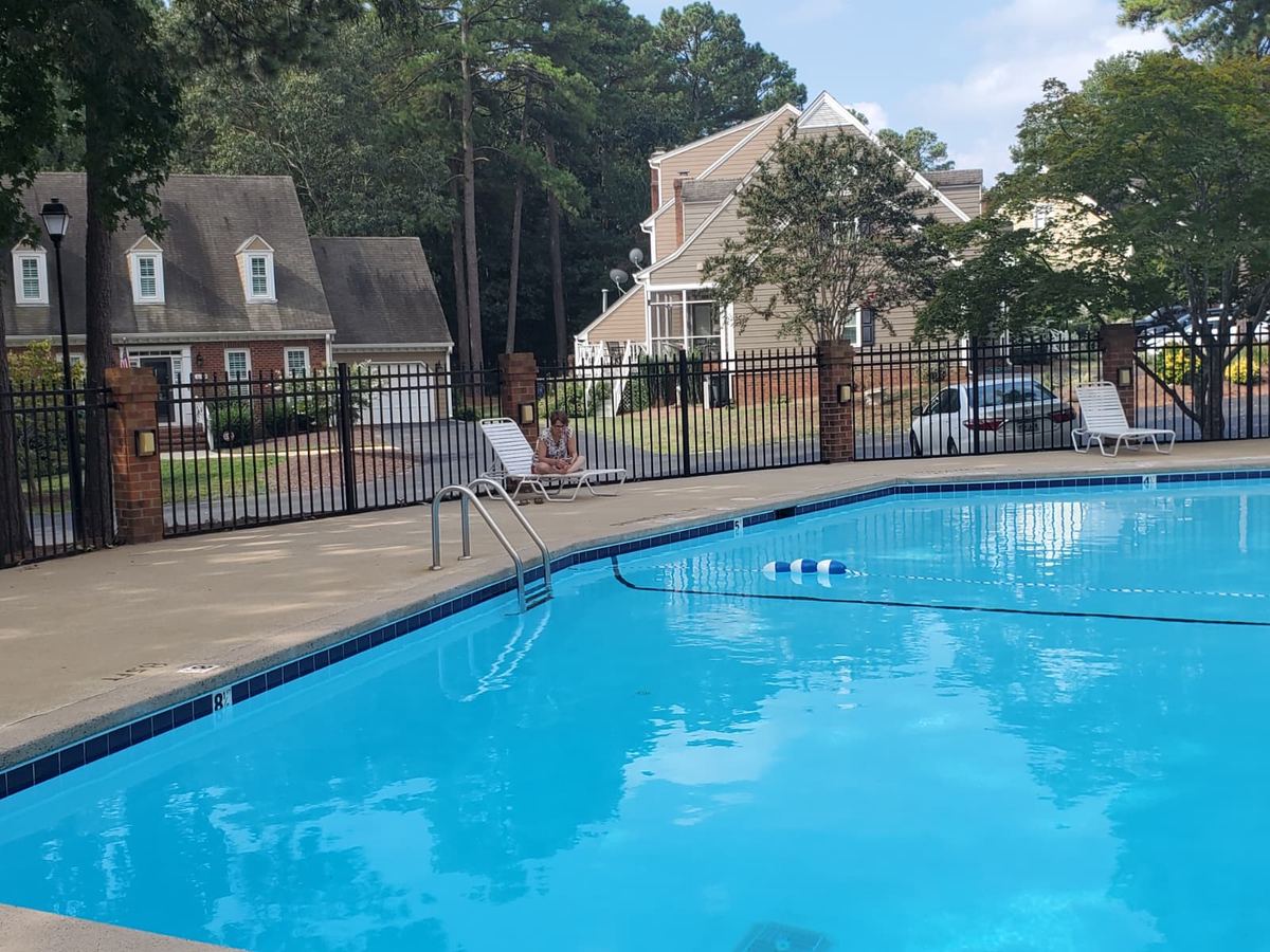 Community pool on a sunny day — Blue Master Pools